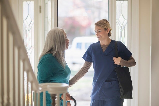 Home Care caregiver entering patient's home