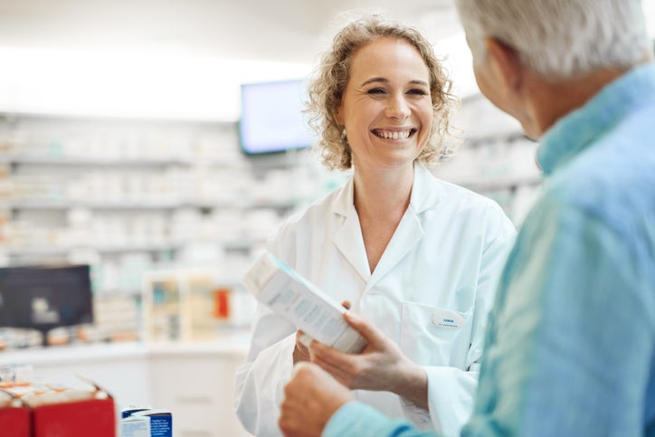 pharmacist with patient