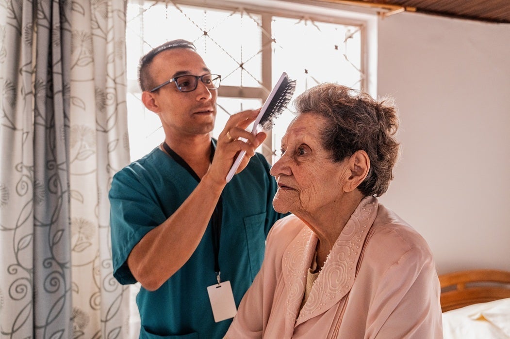 Patient getting hair combed